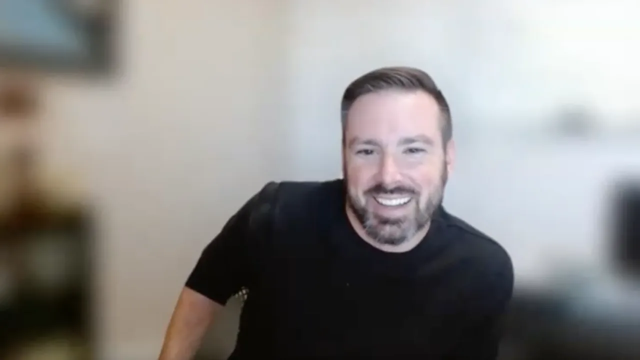 Andy, a father in 100k Fathers, speaking to camera